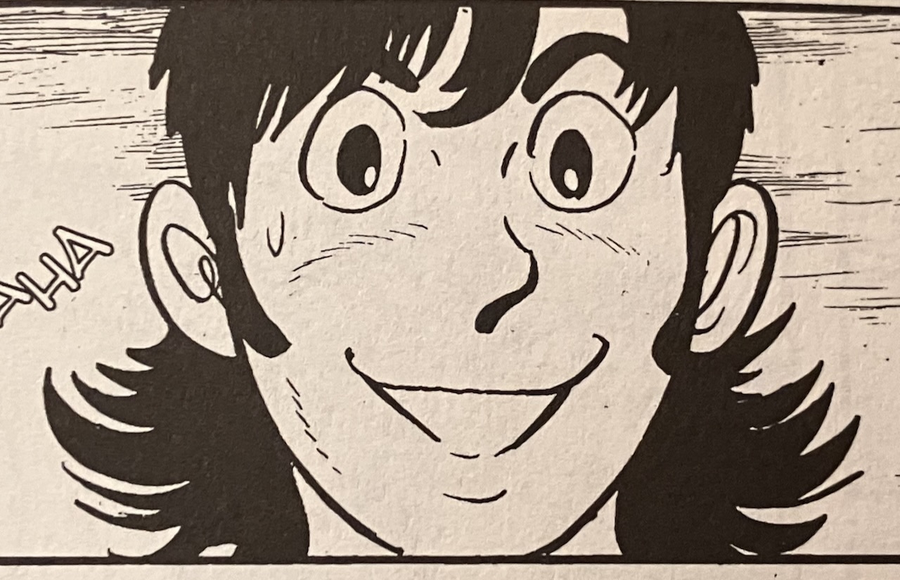 manga image of Tatta, widely smiling
